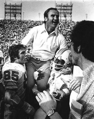 Dolphins coach Don Shula is lofted up by his players. (SI)