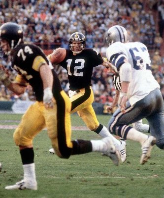 Steelers QB Terry Bradshaw rolls out and looks downfield. (Walter Ioos Jr./SI)