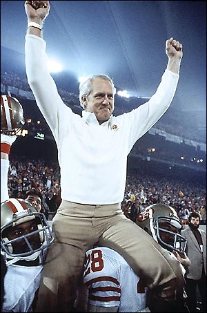 49ers head coach Bill Walsh is carried from the field. (?)