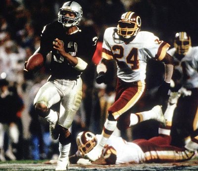 Game MVP Marcus Allen makes his 74-yard dash for a TD. (John Iacono/SI)