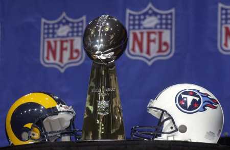 The Ram and Titan helmets pose with the Lombardi Trophy (?)